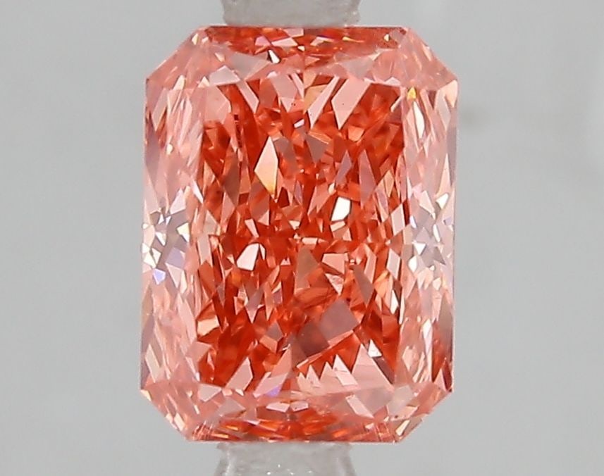 Loose Diamond - RADIANT 1.52ct Fancy Vivid Pink VS2: Loose Diamond - RADIANT 1.52ct Fancy Vivid Pink VS2 Source: This is a real non-mined Diamond that has been grown in a lab Shape: RADIANT Carats: 1.52 Color: Fancy Vivid Pink Certification: IGI Video: