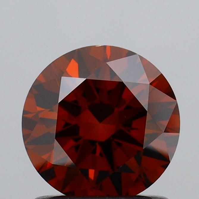 Loose Diamond - ROUND 1.0ct Fancy Deep Orange VS1: Loose Diamond - ROUND 1.0ct Fancy Deep Orange VS1 Source: This is a real non-mined Diamond that has been grown in a lab Shape: ROUND Carats: 1.0 Color: Fancy Deep Orange Certification: IGI Video: