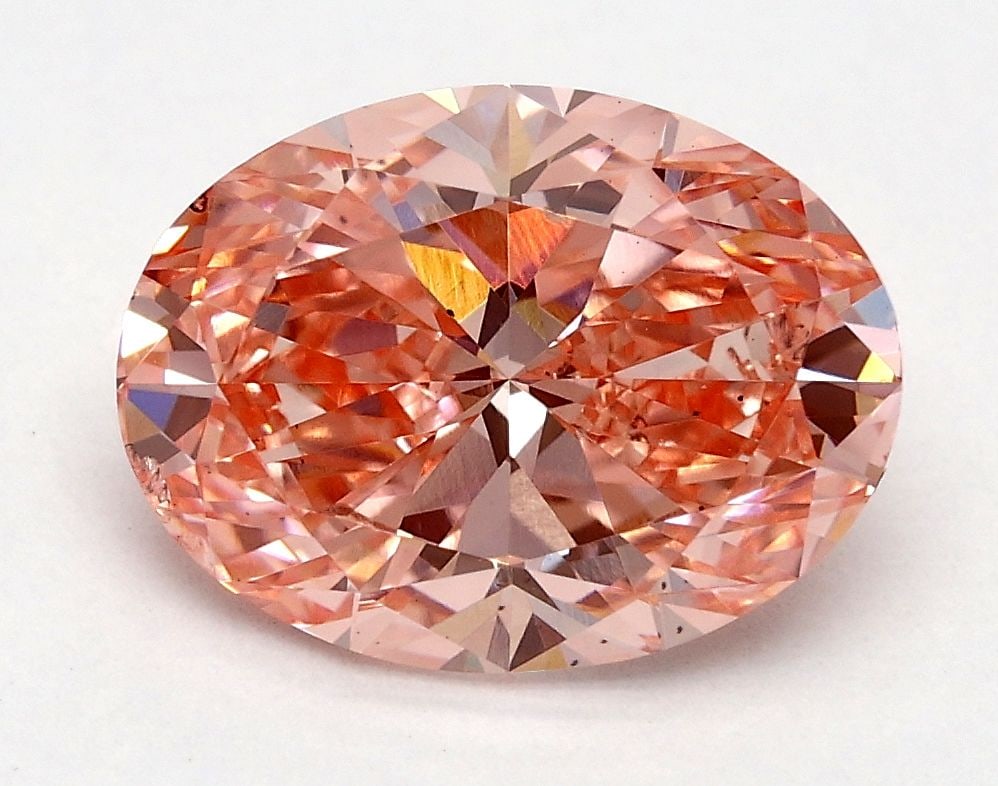 Loose Diamond - OVAL 2.02ct Fancy Vivid Pink SI1: Loose Diamond - OVAL 2.02ct Fancy Vivid Pink SI1 Source: This is a real non-mined Diamond that has been grown in a lab Shape: OVAL Carats: 2.02 Color: Fancy Vivid Pink Certification: IGI Video: