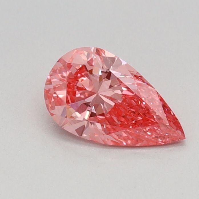 Loose Diamond - ROUND 0.33ct Fancy Vivid Pink VVS2: Loose Diamond - ROUND 0.33ct Fancy Vivid Pink VVS2 Source: This is a real non-mined Diamond that has been grown in a lab Shape: ROUND Carats: 0.33 Color: Fancy Vivid Pink Certification: IGI Video: