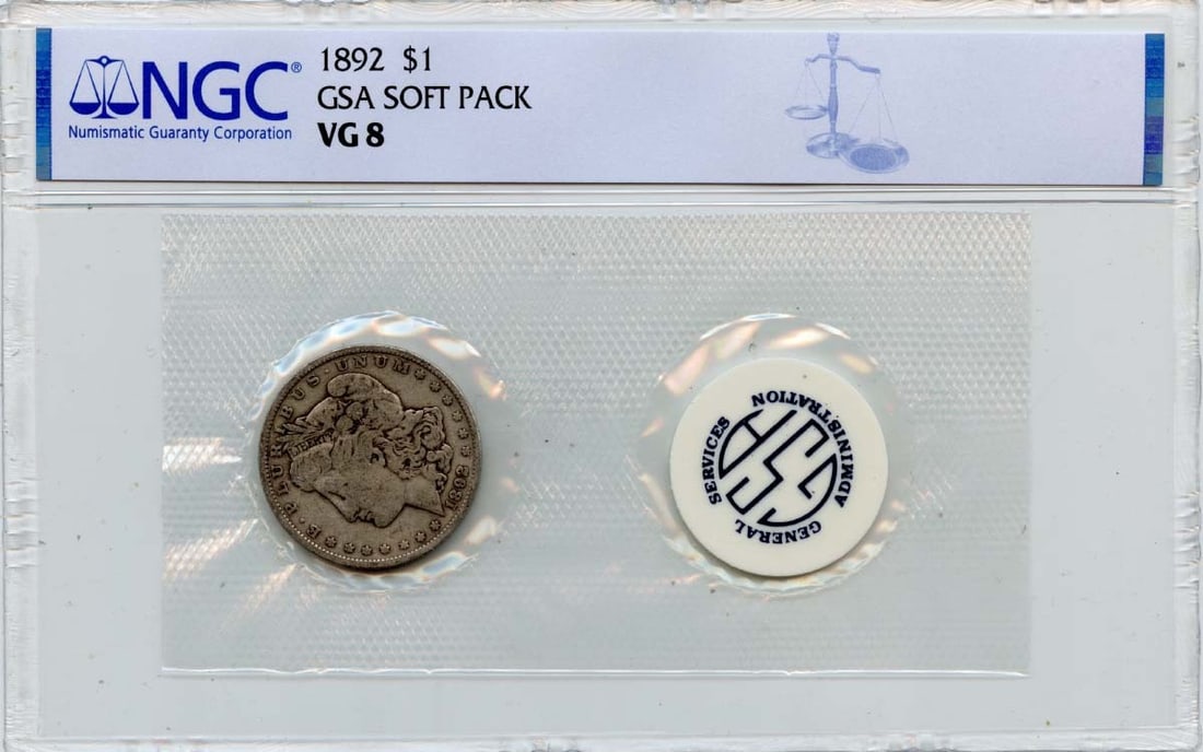 NGC Graded 1892 GSA Soft Pack Morgan Silver Dollar VG8: NGC Graded 1892 GSA Soft Pack Morgan Silver Dollar VG8 This is an 1892 Morgan Dollar in a GSA soft pack, certified by NGC with a VG8 grade. The coin was minted in Philadelphia and is in circulated, pr