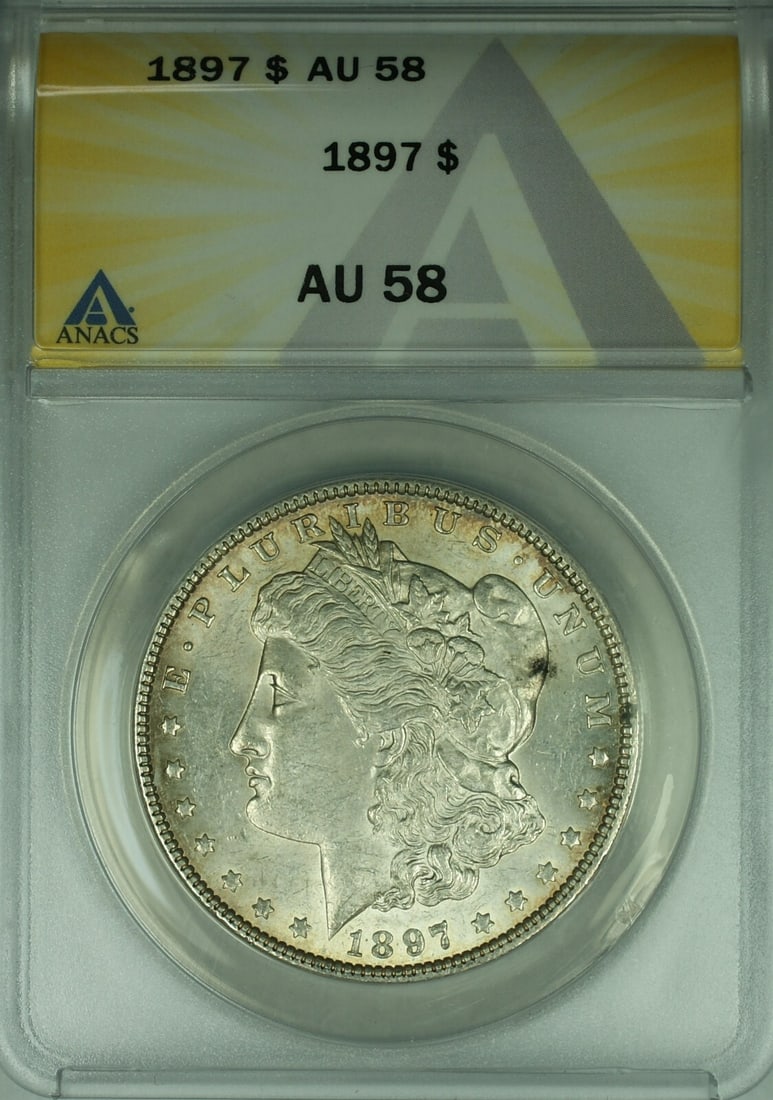 1897 ANACS AU 58 Morgan Dollar Silver Coin Philadelphia Mint: 1897 ANACS AU 58 Morgan Dollar Silver Coin Philadelphia Mint This is a 1897 Morgan Silver Dollar $1 coin from the United States, certified by ANACS with a grade of AU 58. Minted in Philadelphia, this 