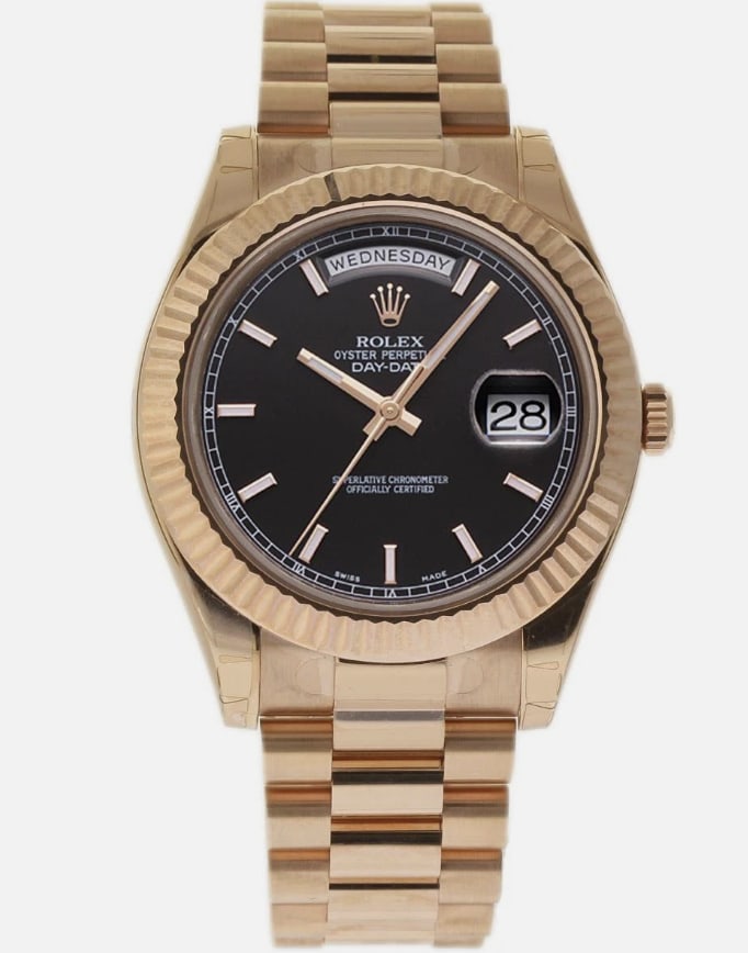 Day-Date Ref 218235 Mens Watch Black Dial President Bracelet Card 2012: Day-Date Ref 218235 Mens Watch Black Dial President Bracelet Card 2012 This Rolex Day-Date features a black index dial and is paired with a fluted bezel and President bracelet. The watch is from the 2