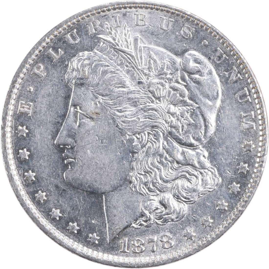 1878 Morgan Silver Dollar AU Uncertified 90% Silver Coin: 1878 Morgan Silver Dollar AU Uncertified 90% Silver Coin This 1878 Morgan Silver Dollar features a classic design by George T. Morgan and is composed of 90% silver and 10% copper. This coin has been c
