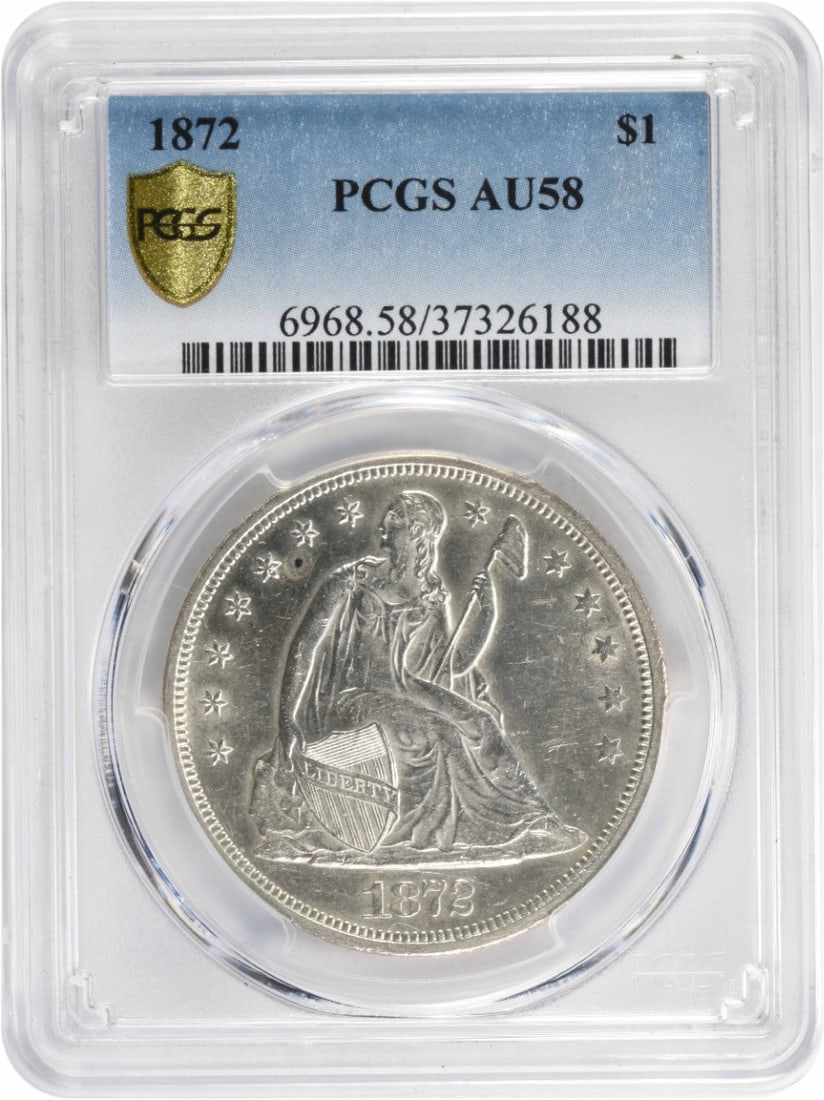 1872 Liberty Seated Silver Dollar AU58 Certified PCGS: 1872 Liberty Seated Silver Dollar AU58 Certified PCGS This 1872 Liberty Seated Silver Dollar is a cherished piece for coin collectors. Graded AU58 by PCGS, this coin showcases the classic Seated Liber
