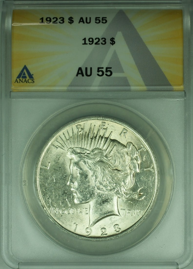 ANACS AU 55 Graded 1923 Peace Silver Dollar from Philadelphia Mint: ANACS AU 55 Graded 1923 Peace Silver Dollar from Philadelphia Mint This is a 1923 Peace Silver Dollar graded AU-55 by ANACS. Minted in Philadelphia, this circulated coin is composed of silver and has 