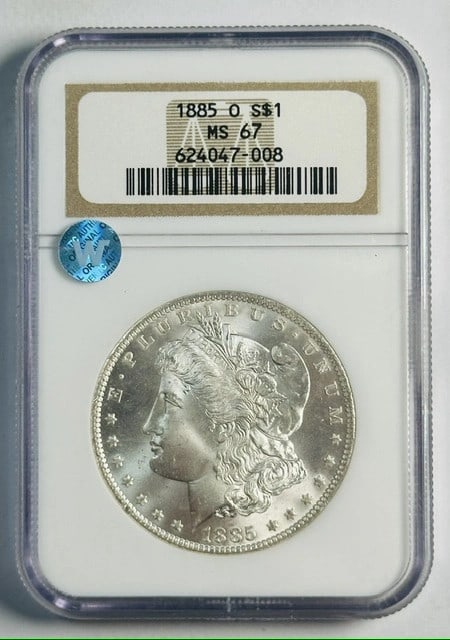 NGC MS67 1885 New Orleans Morgan Dollar Silver Coin: NGC MS67 1885 New Orleans Morgan Dollar Silver Coin This 1885 O Morgan Silver Dollar is certified by NGC with a high grade of MS 67, indicating an uncirculated and well-preserved coin. Minted in New O