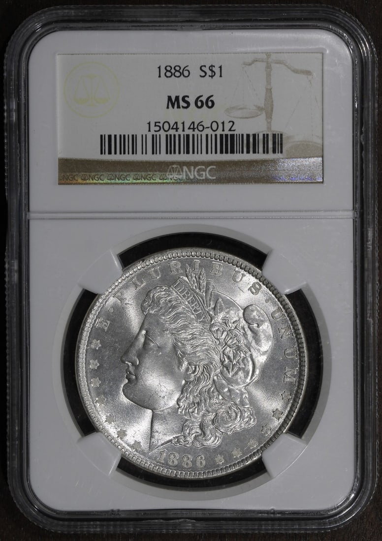 NGC MS66 1886 Morgan Dollar Philadelphia Uncirculated Silver Coin: NGC MS66 1886 Morgan Dollar Philadelphia Uncirculated Silver Coin This is an un-used 1886 Morgan Silver Dollar graded MS66 by NGC. Struck in Philadelphia, this coin is composed of 90% silver and repre