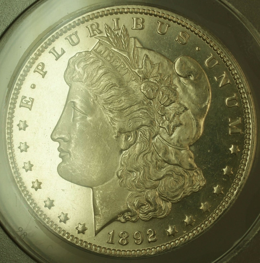 Prooflike 1892-O Morgan Silver Dollar ANACS MS65 Certified Ultra Rare Gem: Prooflike 1892-O Morgan Silver Dollar ANACS MS65 Certified Ultra Rare Gem This is an uncirculated 1892-O Morgan Silver Dollar $1 coin, certified by ANACS with a grade of MS-65 PL (Proof-Like). The coi
