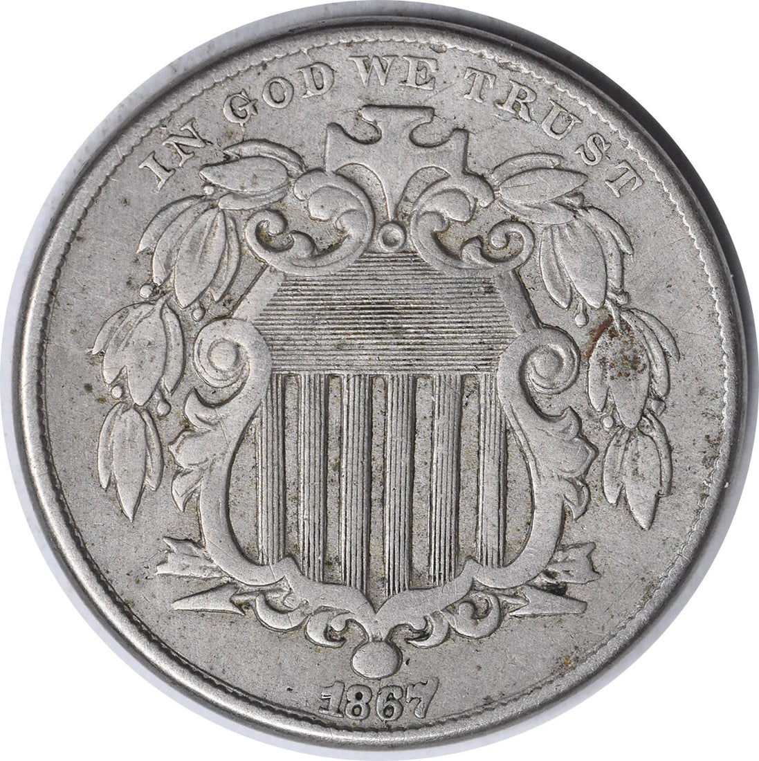 1867 Shield Nickel No Rays XF Uncertified Philadelphia Mint: 1867 Shield Nickel No Rays XF Uncertified Philadelphia Mint This 1867 Shield Nickel is a fascinating piece of numismatic history, featuring the design by James Barton Longacre. The coin is classified 