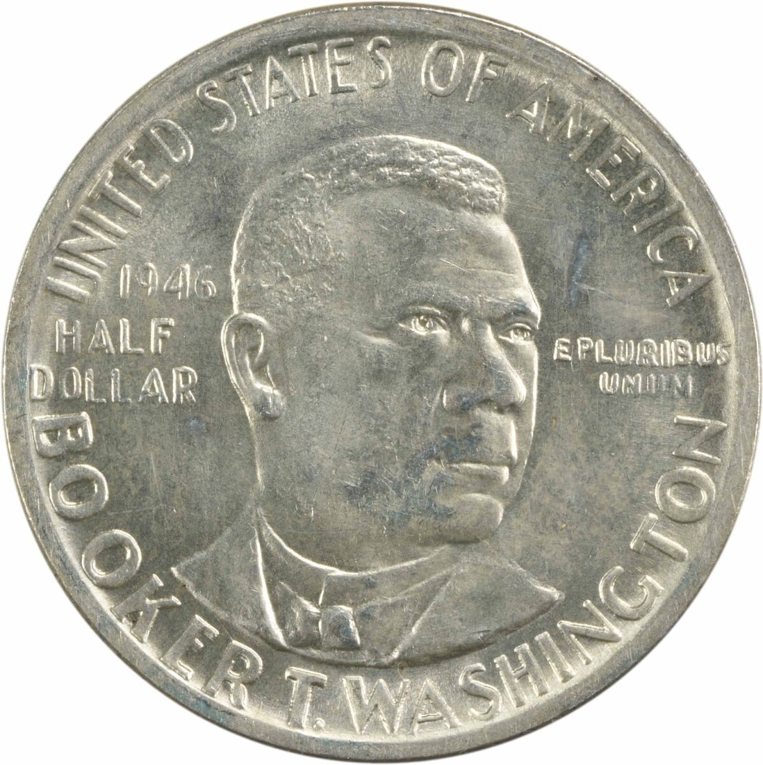 1946 Washington Booker T Commemorative Half Dollar Choice BU Uncertified: 1946 Washington Booker T Commemorative Half Dollar Choice BU Uncertified This 1946 Booker T. Washington Commemorative Half Dollar is a stunning piece of numismatic history. Struck in silver, this coin