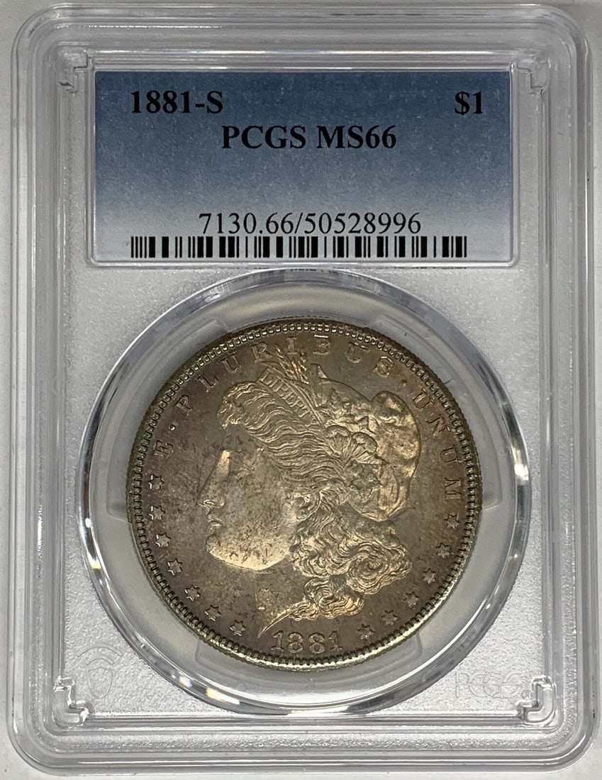 PCGS MS 66 1881-S Morgan Silver Dollar with Toning: PCGS MS 66 1881-S Morgan Silver Dollar with Toning This is an 1881-S Morgan Silver Dollar featuring a natural toned appearance. The coin is uncirculated and has been professionally graded as MS 66 by 