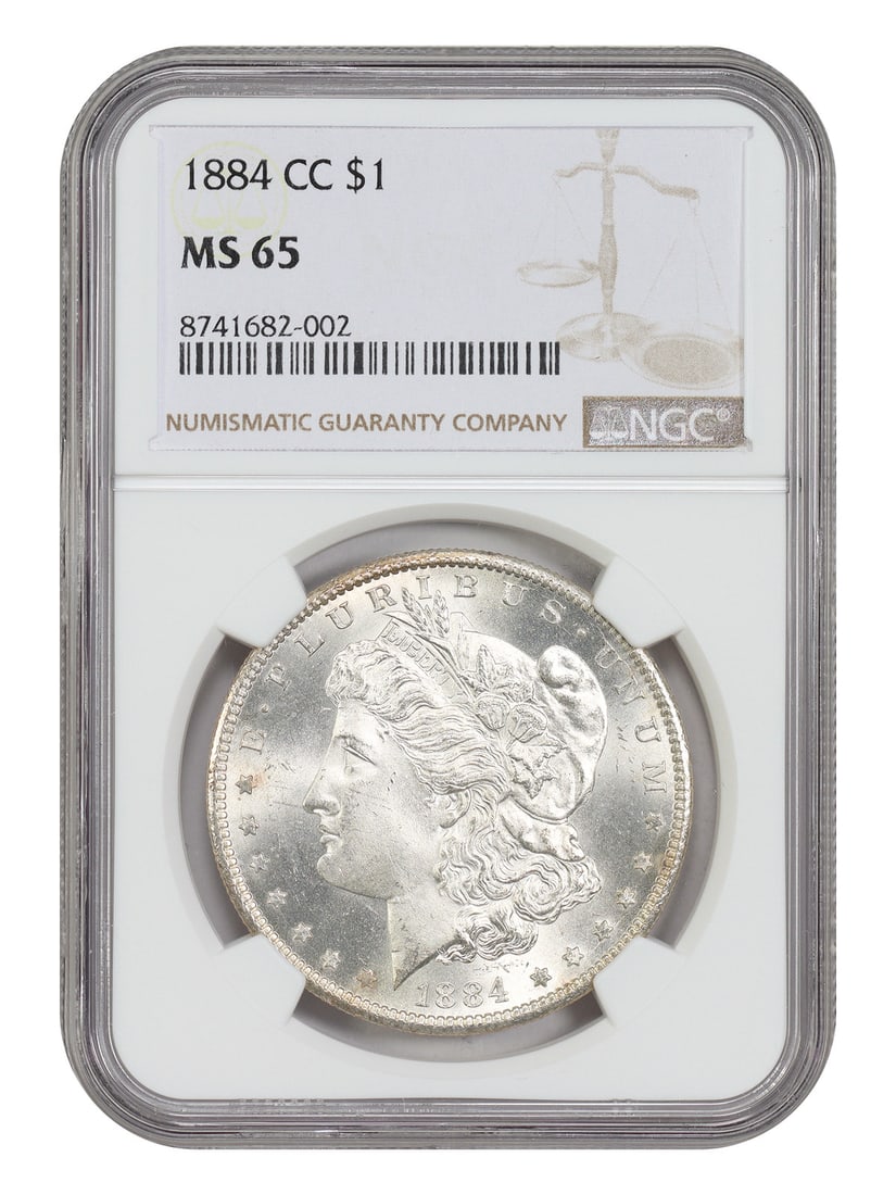 NGC MS65 Carson City 1884 Morgan Silver Dollar: NGC MS65 Carson City 1884 Morgan Silver Dollar This is an uncirculated 1884-CC Morgan Dollar, certified by NGC with a grade of MS65. Struck at the Carson City Mint, this coin is a popular example from