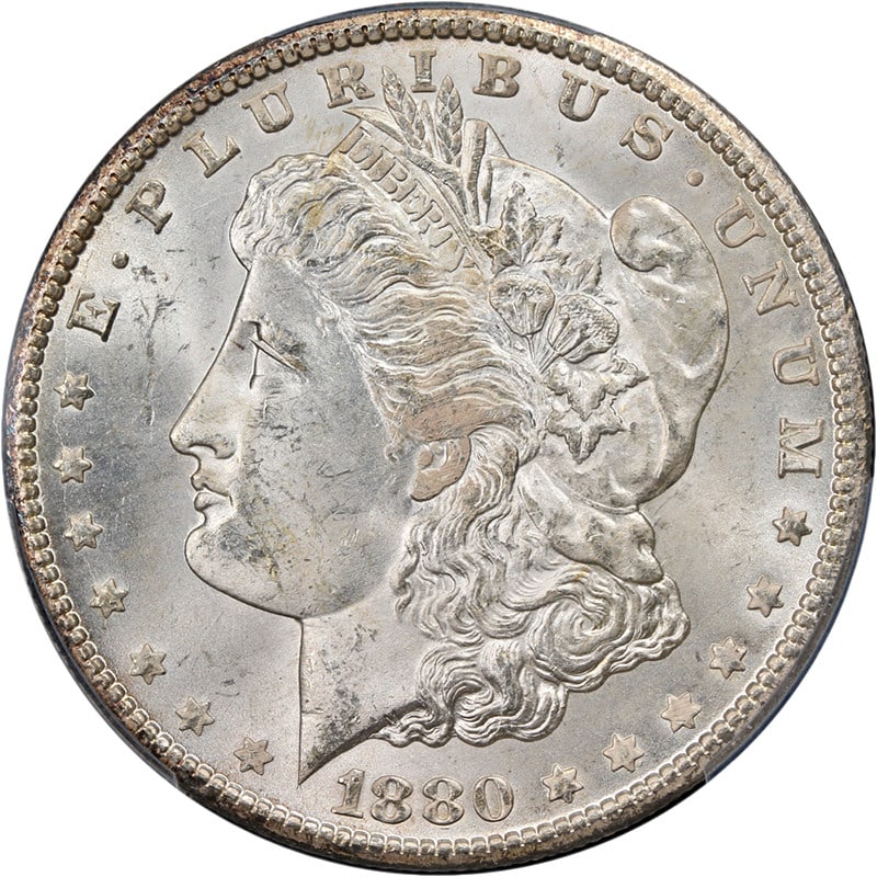 PCGS MS64 1880 Carson City Morgan Dollar Silver Coin with Strong Luster: PCGS MS64 1880 Carson City Morgan Dollar Silver Coin with Strong Luster This 1880-CC Morgan Silver Dollar is graded PCGS MS64, featuring strong eye appeal, attractive luster, and a sharp strike. The c
