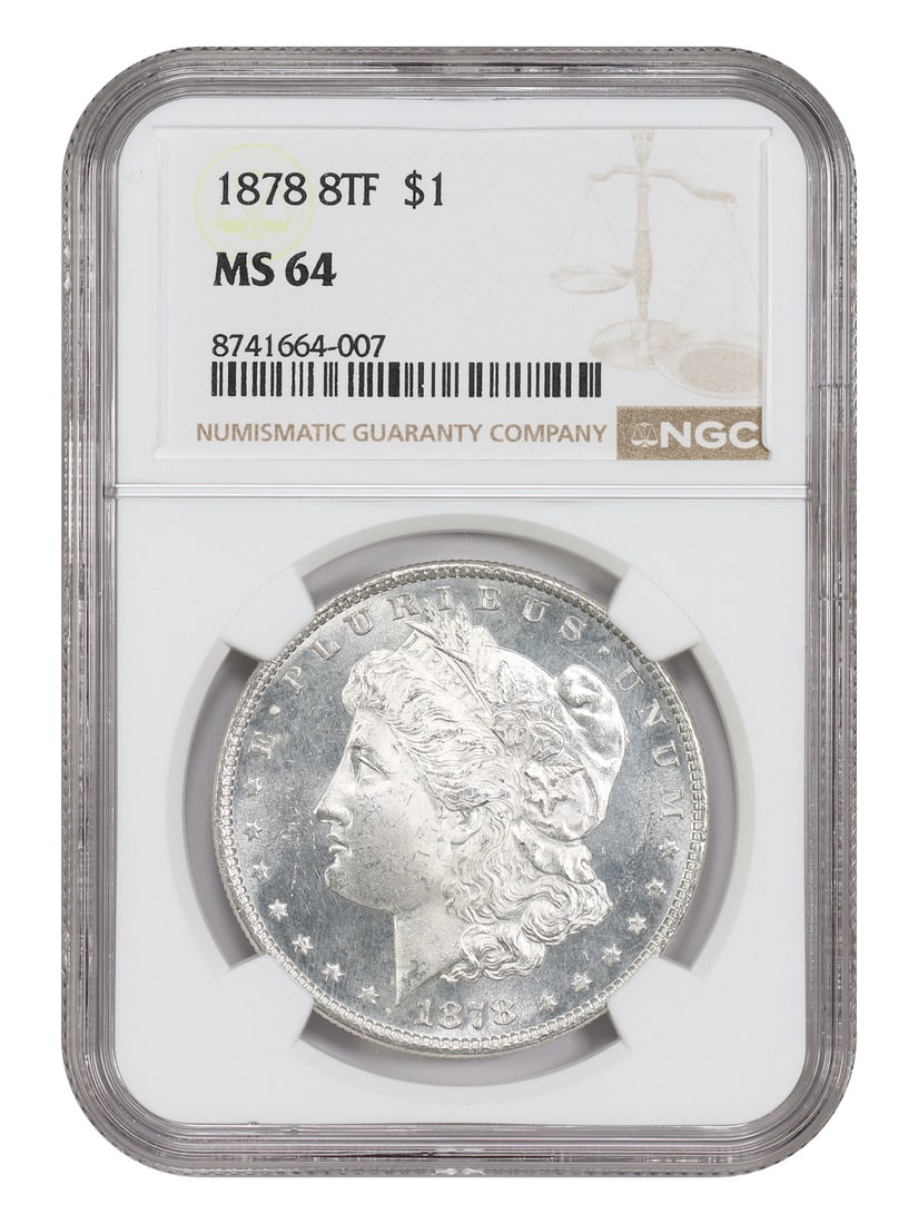 NGC MS64 1878 8 Tailfeather Silver Dollar First Year Philadelphia Issue: NGC MS64 1878 8 Tailfeather Silver Dollar First Year Philadelphia Issue This 1878 Morgan Dollar features the important first-year 8 Tailfeathers (8TF) reverse design, minted in Philadelphia. Graded MS