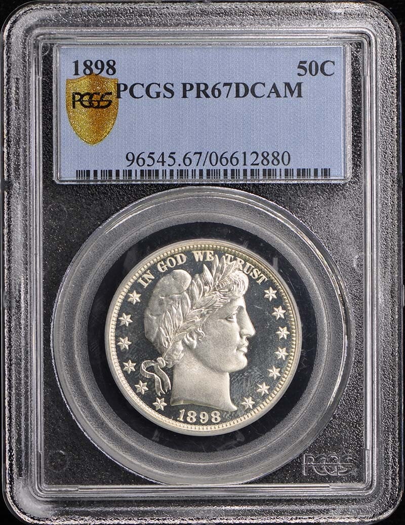 1898 Barber Half Dollar PCGS PR67DCAM Proof Uncirculated: 1898 Barber Half Dollar PCGS PR67DCAM Proof Uncirculated This 1898 50C Barber Half Dollar is a remarkable piece, certified by PCGS with a grade of PR67DCAM. It was minted in Philadelphia and features 