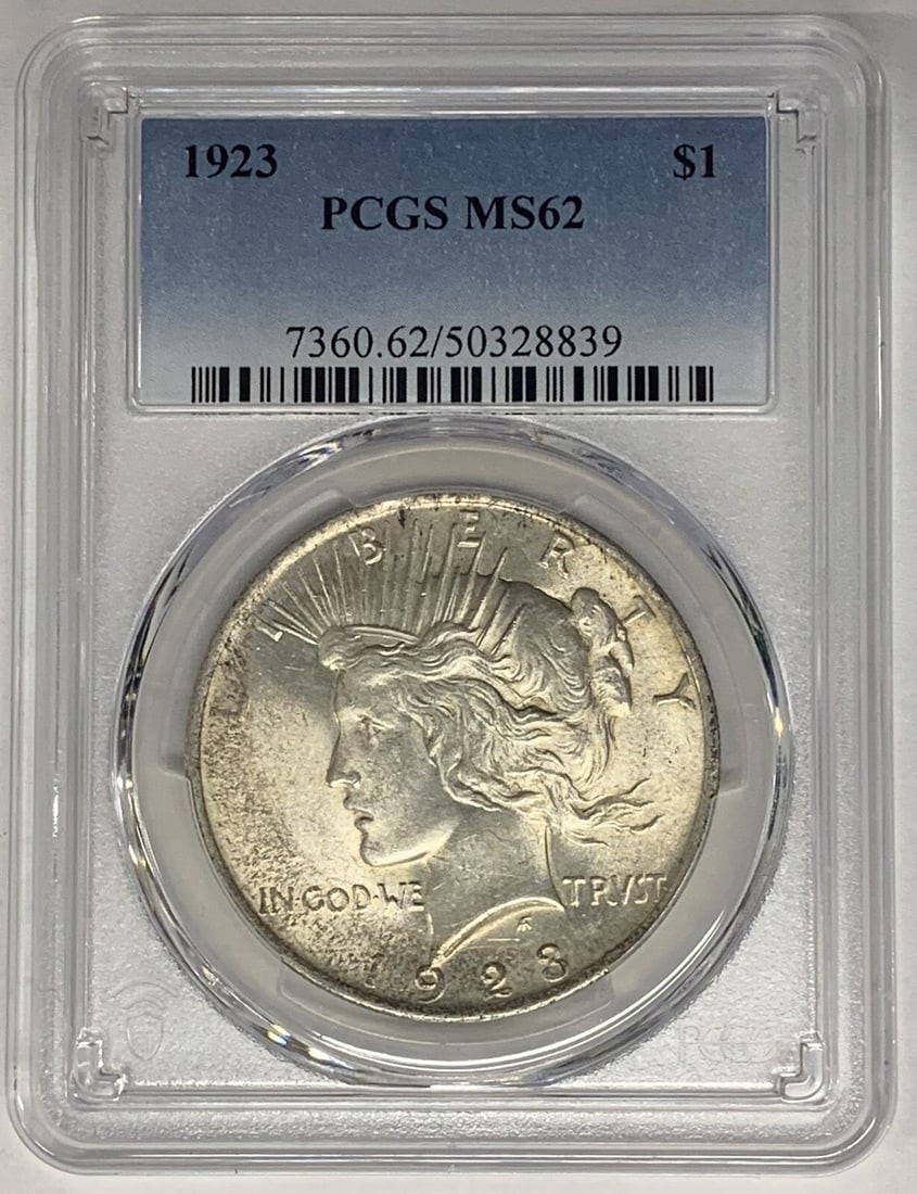 1923 Peace Dollar Silver Coin PCGS MS 62 Certified Uncirculated: 1923 Peace Dollar Silver Coin PCGS MS 62 Certified Uncirculated This is a 1923 Peace Silver Dollar coin from the United States, certified by PCGS with a grade of MS 62. The coin is uncirculated and co