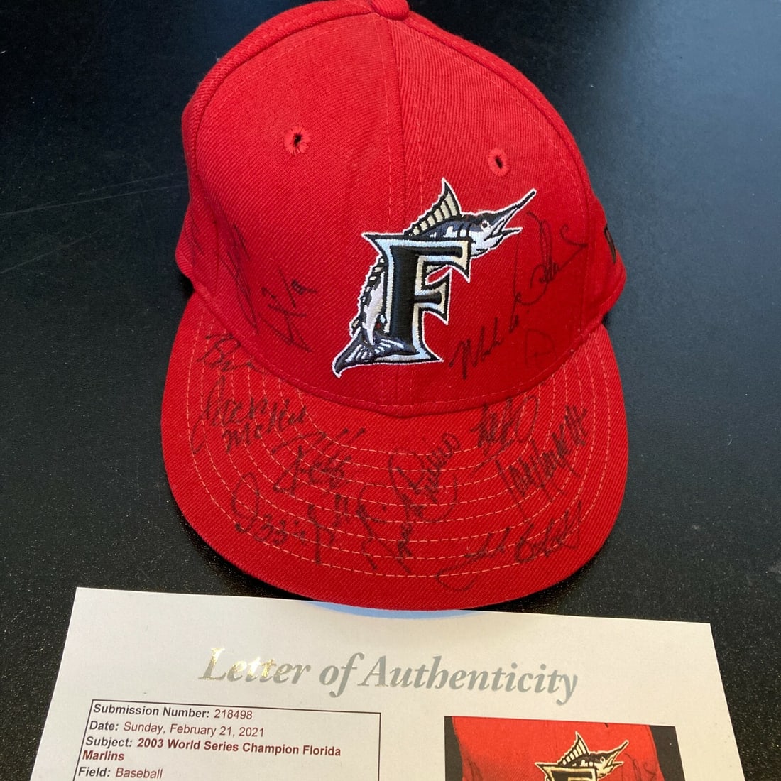 2003 Florida Marlins Team Signed Hat with JSA COA: 2003 Florida Marlins Team Signed Hat with JSA COA Celebrate the historic 2003 Florida Marlins World Series Championship with this team-signed game model hat. Authentically autographed by notable playe
