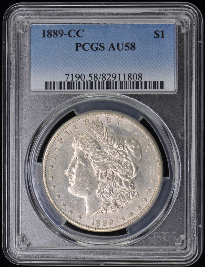 1889-CC Morgan Dollar PCGS AU58 Certified Coin: 1889-CC Morgan Dollar PCGS AU58 Certified Coin Offered is a 1889-CC Morgan Dollar, certified by PCGS with a grade of AU58. This coin hails from the Carson City mint and is classified as circulated. A 