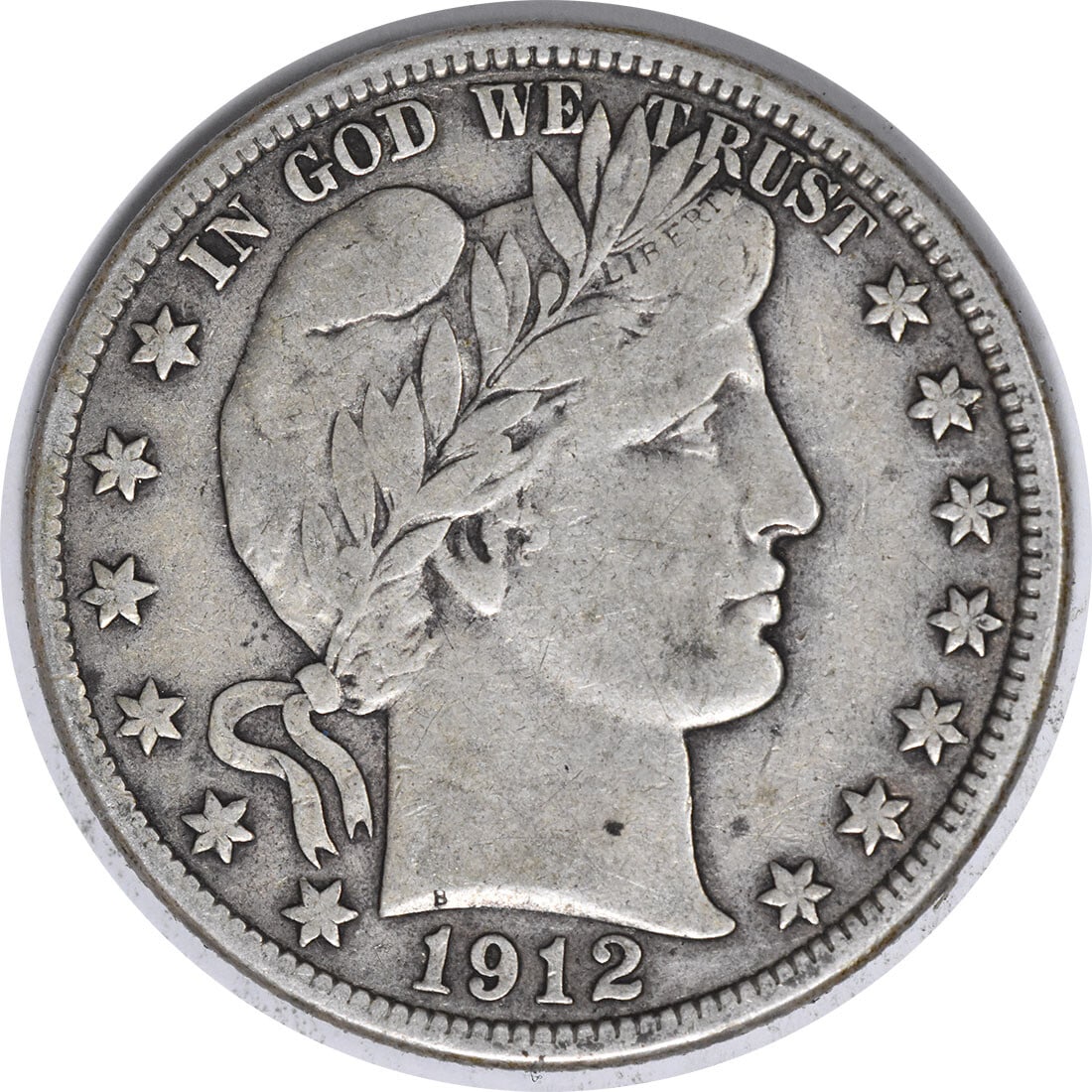 1912-D Barber Silver Half Dollar 50C VF Uncertified Coin: 1912-D Barber Silver Half Dollar 50C VF Uncertified Coin This 1912-D Barber Silver Half Dollar features a beautiful design by Charles E. Barber and is a great addition for any coin collector. Struck a