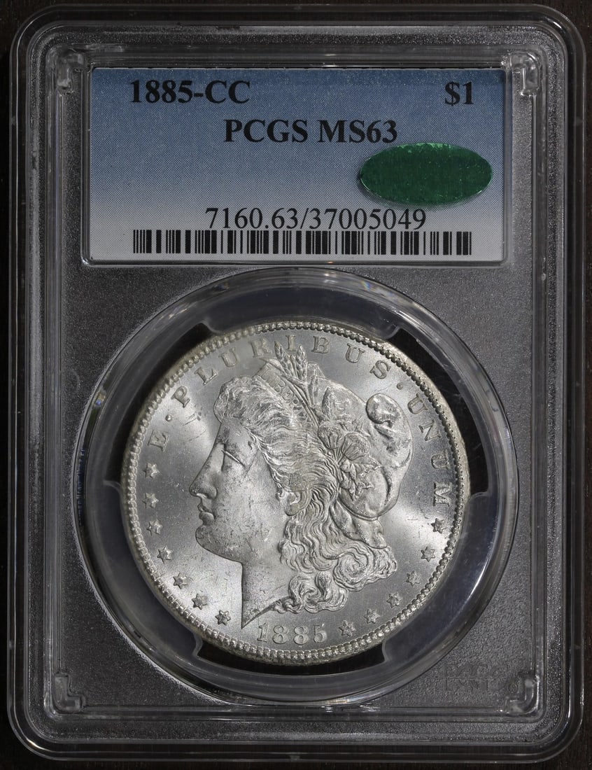 PCGS CAC Graded 1885 Carson City Morgan Dollar MS63 Blast White: PCGS CAC Graded 1885 Carson City Morgan Dollar MS63 Blast White This is an 1885-CC Morgan Silver Dollar graded MS63 by PCGS and certified by CAC. The coin is uncirculated and features a blast white ap