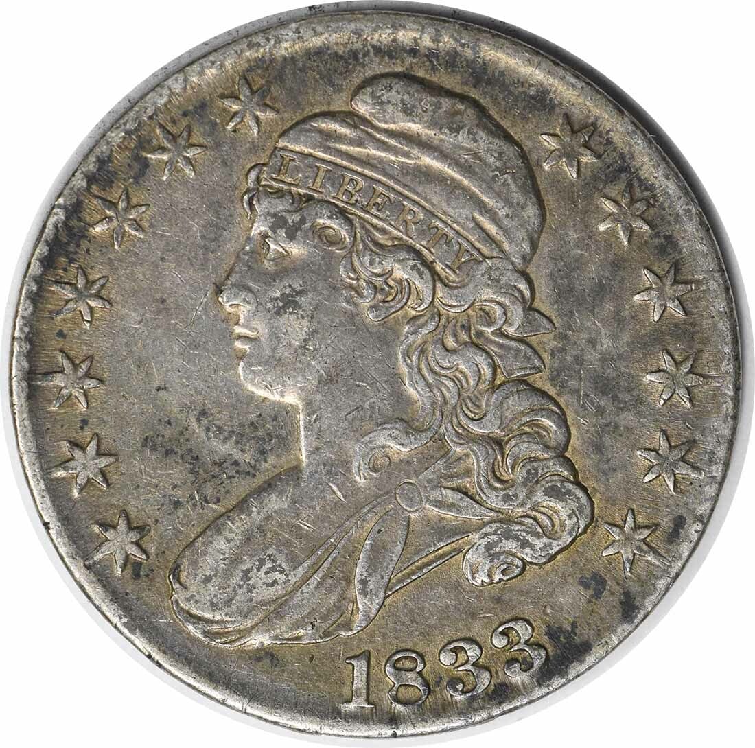 1833 Bust Half Dollar 50C Uncertified Silver Coin John Reich Design: 1833 Bust Half Dollar 50C Uncertified Silver Coin John Reich Design This 1833 Bust Half Dollar is a remarkable piece of American coinage, featuring a classic design by John Reich. Struck in Philadelph