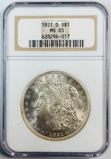 1921 Denver Morgan Dollar Silver NGC MS65 Uncirculated White: 1921 Denver Morgan Dollar Silver NGC MS65 Uncirculated White This is a 1921 D Morgan Silver Dollar graded MS-65 by NGC. Struck at the Denver Mint, this uncirculated coin features a silver composition 