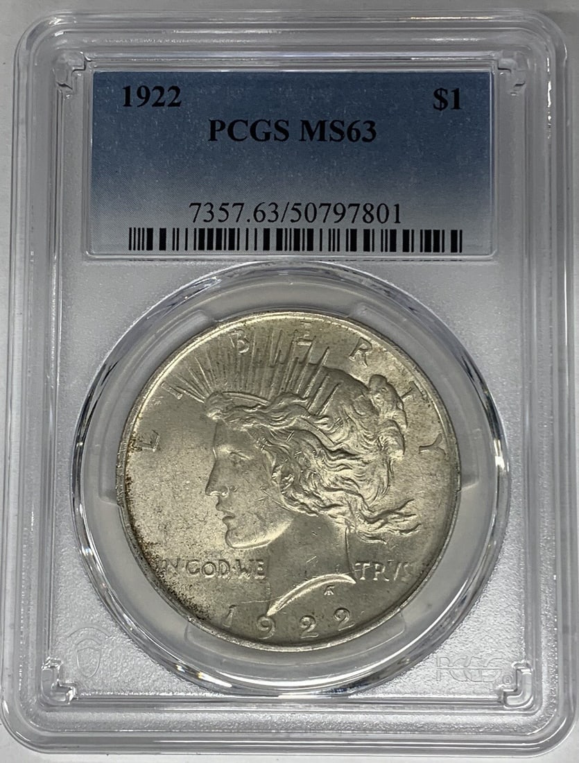 PCGS Certified 1922 Peace Silver Dollar MS 63 Uncirculated $1 Coin: PCGS Certified 1922 Peace Silver Dollar MS 63 Uncirculated $1 Coin This 1922 Peace Silver Dollar coin has been graded MS 63 by PCGS. Struck in silver, it is an uncirculated example from the United Sta