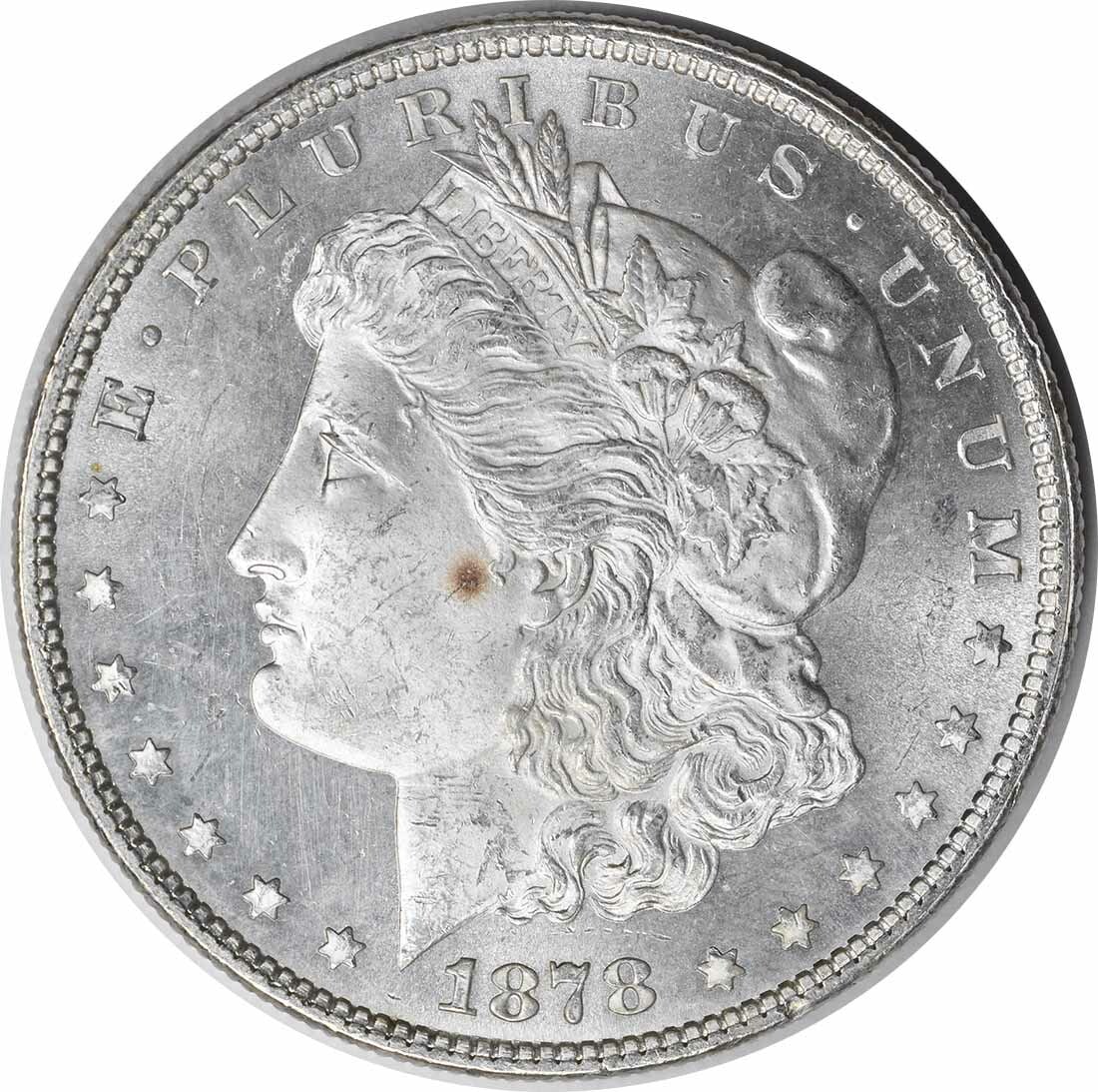 1878 Silver Dollar Morgan 7 Over 8 Tail Feathers Choice BU Uncirculated: 1878 Silver Dollar Morgan 7 Over 8 Tail Feathers Choice BU Uncirculated This is a 1878 Morgan Silver Dollar featuring the 7/8 Tail Feathers variety. The coin is uncirculated and graded as Choice Brill