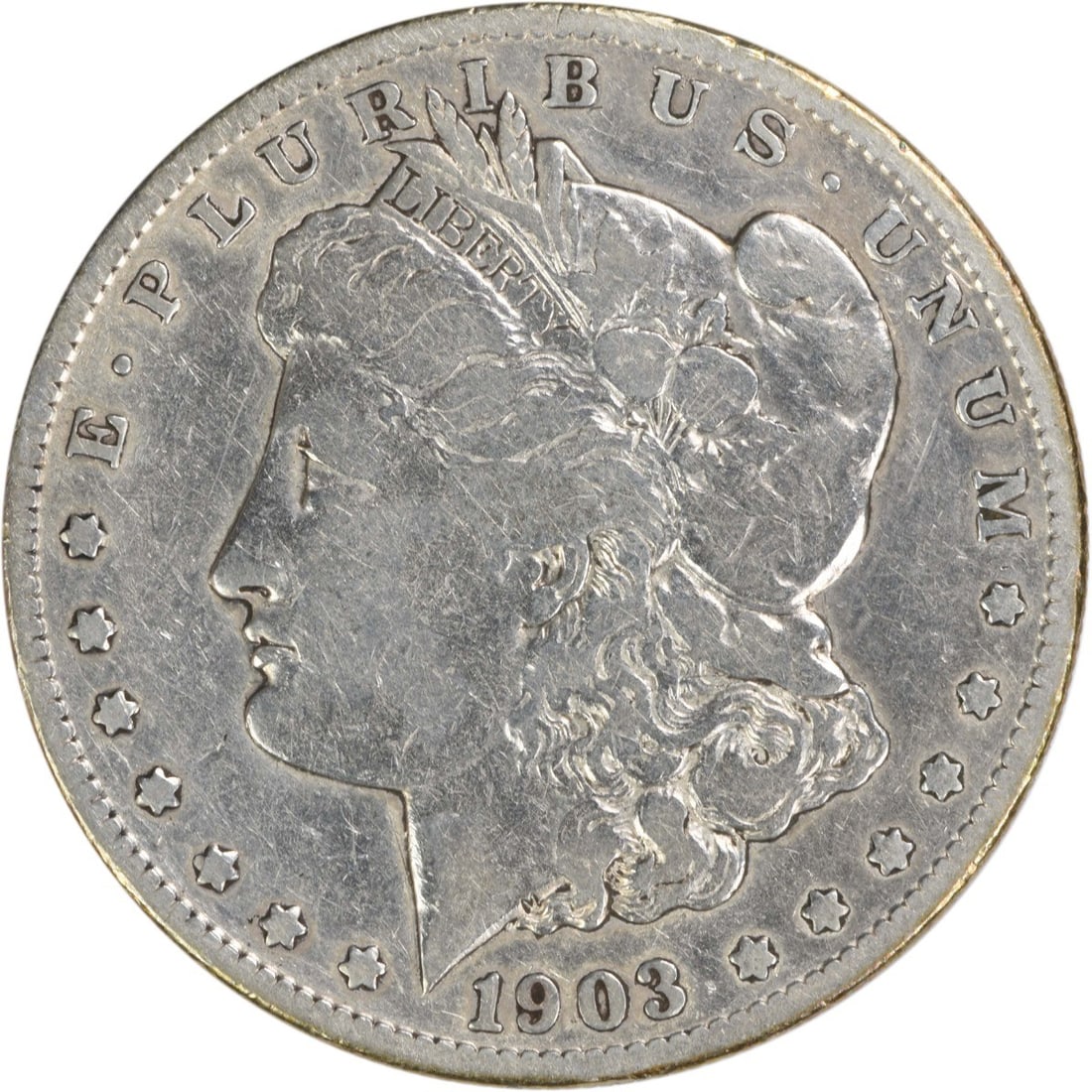 1903 San Francisco Morgan Dollar VG Grade 90 Percent Silver Uncertified: 1903 San Francisco Morgan Dollar VG Grade 90 Percent Silver Uncertified This 1903-S Morgan Silver Dollar is a circulated coin from the San Francisco Mint. Designed by George T. Morgan, it is composed 