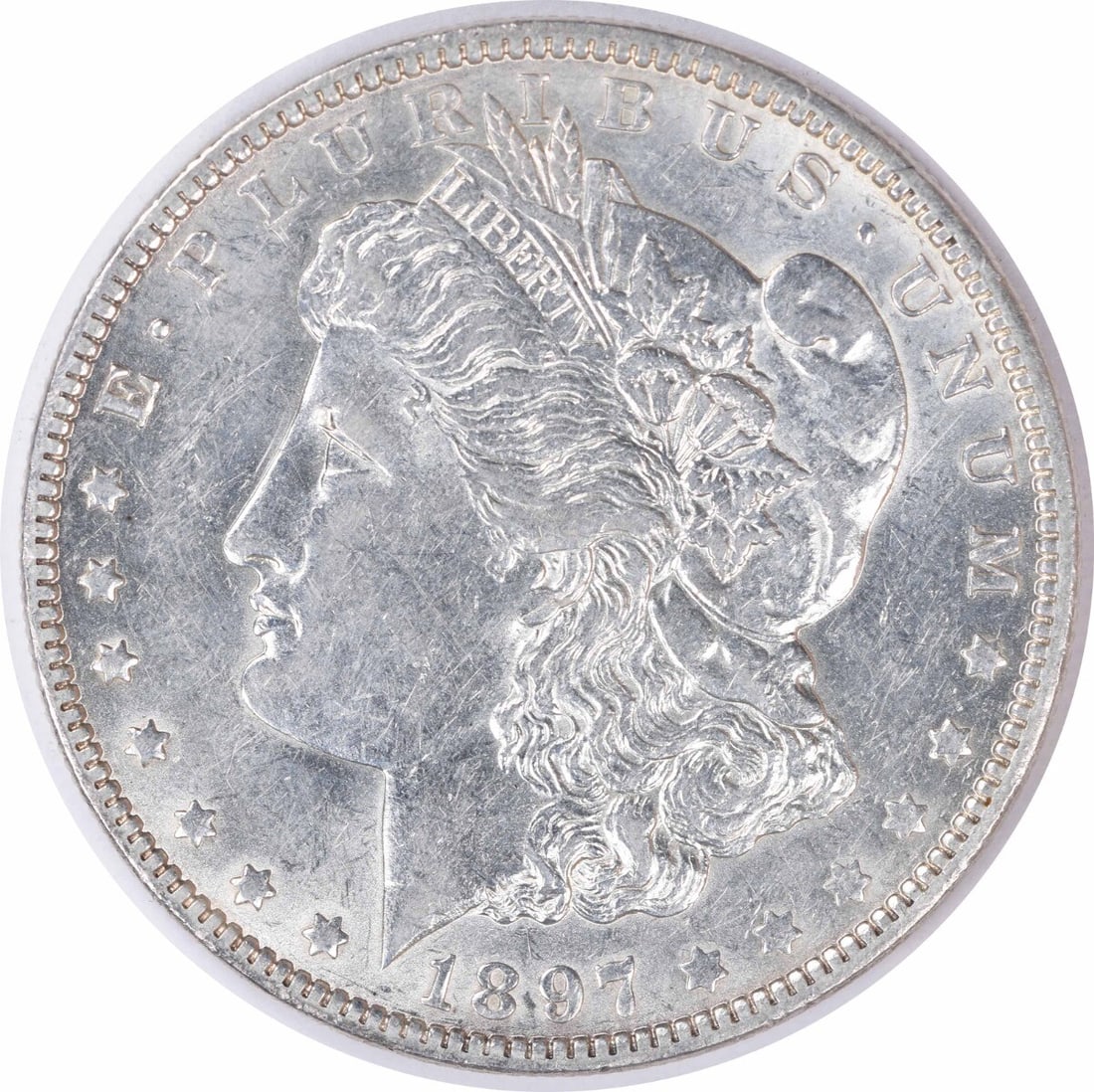 1897-O Morgan Silver Dollar AU Uncertified 90% Silver Coin: 1897-O Morgan Silver Dollar AU Uncertified 90% Silver Coin This 1897-O Morgan Silver Dollar features a beautiful design by George T. Morgan and is made of 90% silver and 10% copper. It is in an AU (Al