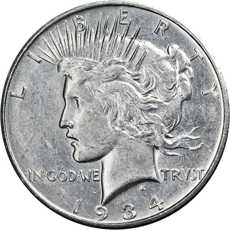 Peace Dollar 1934 D Micro D Silver Coin Choice AU to BU Grade: Peace Dollar 1934 D Micro D Silver Coin Choice AU to BU Grade This 1934-D Peace Dollar features the rare Micro 'D' variety and is composed of 90% silver. Graded as Choice About Uncirculated to Brillia