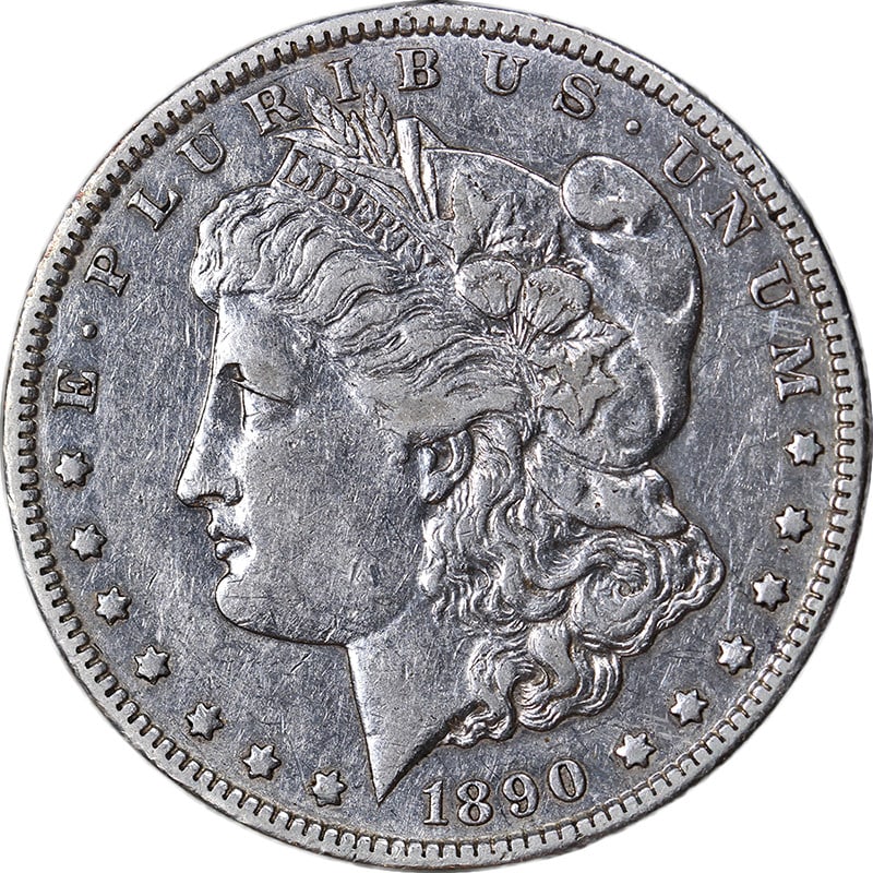 Carson City 1890 Silver Morgan Dollar Choice XF Uncertified: Carson City 1890 Silver Morgan Dollar Choice XF Uncertified This 1890-CC Morgan Silver Dollar is an exceptional piece featuring great eye appeal and a nice strike. The coin is composed of 90% silver, 