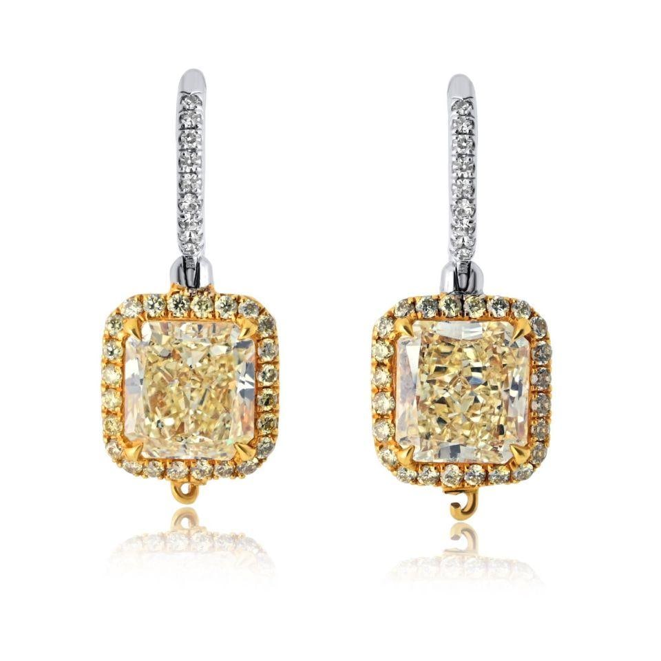 Handmade Drop Earrings With GIA Fancy Yellow Radiant Diamonds in Platinum and 18K Gold: Handmade Drop Earrings With GIA Fancy Yellow Radiant Diamonds in Platinum and 18K Gold These un-used handmade drop earrings feature platinum and 18K yellow gold settings adorned with fancy yellow radi