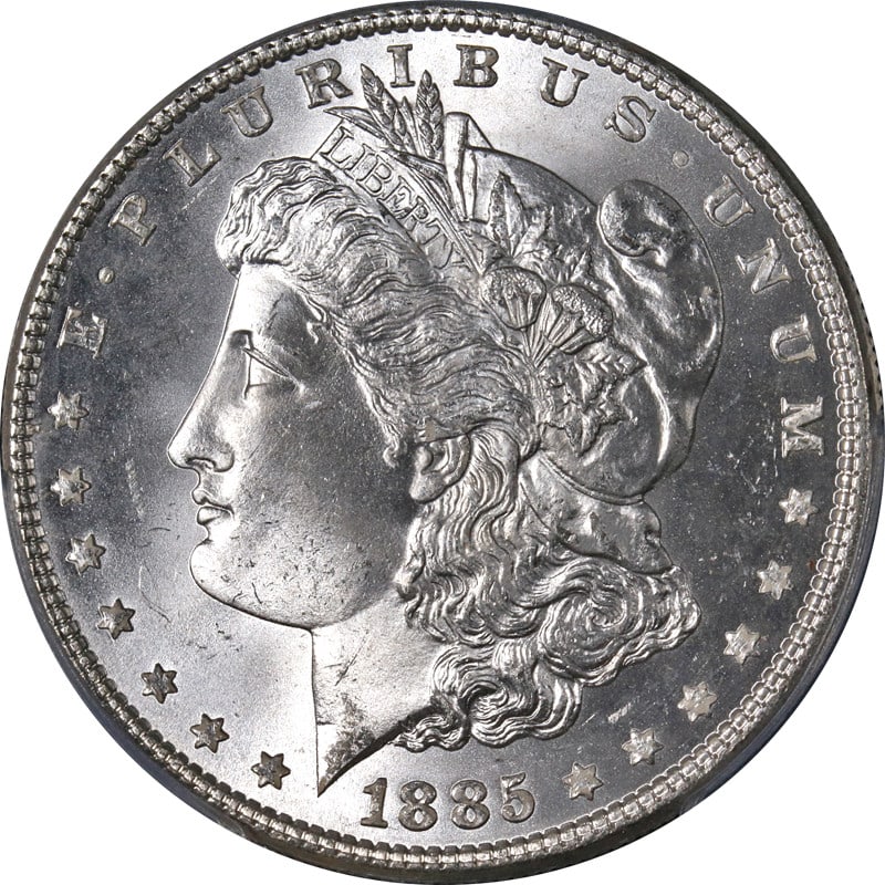 1885-P Morgan Silver Dollar PCGS MS65 Strong Strike Blast White: 1885-P Morgan Silver Dollar PCGS MS65 Strong Strike Blast White This 1885-P Morgan Silver Dollar is a remarkable piece, certified by PCGS with a grade of MS65. It exhibits stunning blast white surface