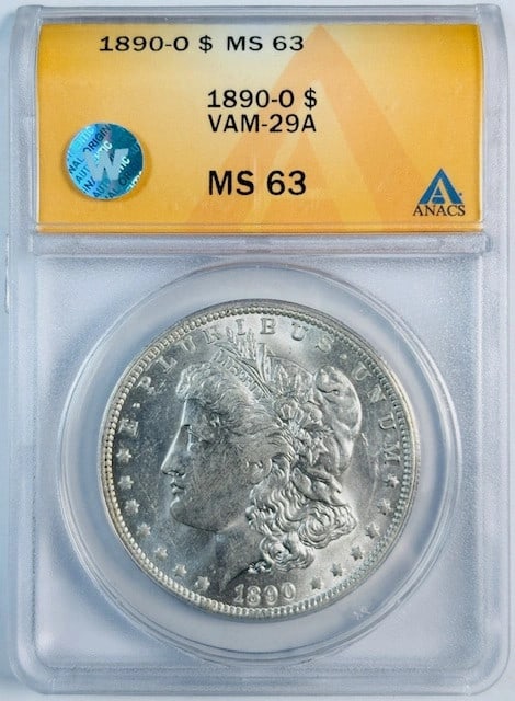 ANACS MS63 1890 New Orleans Silver Dollar VAM-29A Variety: ANACS MS63 1890 New Orleans Silver Dollar VAM-29A Variety This is an 1890 O Morgan Silver Dollar graded MS-63 by ANACS, featuring the VAM-29A variety. The coin is uncirculated, minted in New Orleans, 