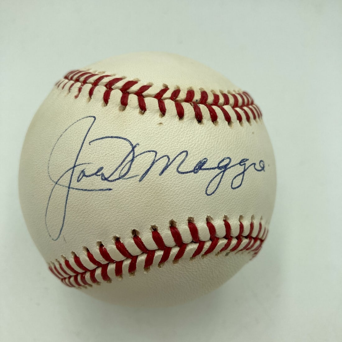 Joe DiMaggio Signed American League Baseball with JSA COA: Joe DiMaggio Signed American League Baseball with JSA COA This is an authentic Joe DiMaggio signed Official American League baseball, featuring the legendary New York Yankees player's autograph. The b