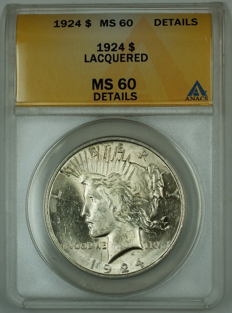 1924 Silver Peace Dollar ANACS MS-60 Details Lacquered Uncirculated: 1924 Silver Peace Dollar ANACS MS-60 Details Lacquered Uncirculated This is a 1924 Peace Silver Dollar coin graded MS-60 Details by ANACS, featuring a lacquered surface. The coin is uncirculated and w