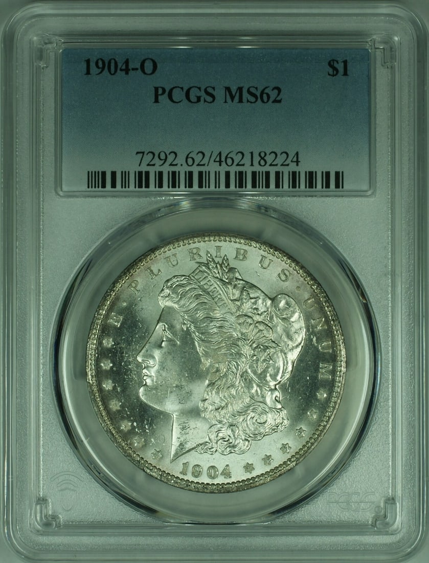 PCGS MS62 1904-O New Orleans Morgan Dollar Silver Coin: PCGS MS62 1904-O New Orleans Morgan Dollar Silver Coin This 1904-O Morgan Silver Dollar is an uncirculated coin graded MS-62 by PCGS. Minted in New Orleans, it features a silver composition with a fin