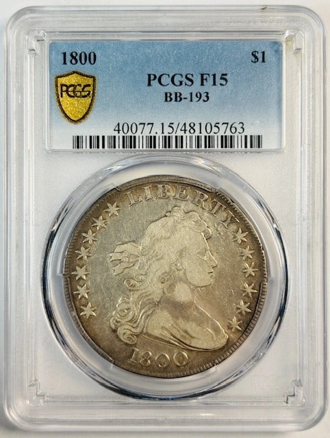 Draped Bust 1800 Silver Dollar BB-193 PCGS F15 Certified: Draped Bust 1800 Silver Dollar BB-193 PCGS F15 Certified This 1800 Draped Bust Silver Dollar is certified by PCGS with a grade of F 15. It is composed of silver and was minted in Philadelphia. The coi