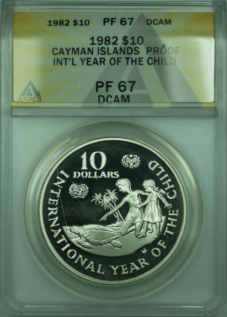 1982 Cayman Islands $10 Silver Proof Coin ANACS PR 67 Year of Child: 1982 Cayman Islands $10 Silver Proof Coin ANACS PR 67 Year of Child This is a 1982 Cayman Islands $10 silver proof Year of the Child commemorative coin. The coin is composed of 0.925 fine silver and h