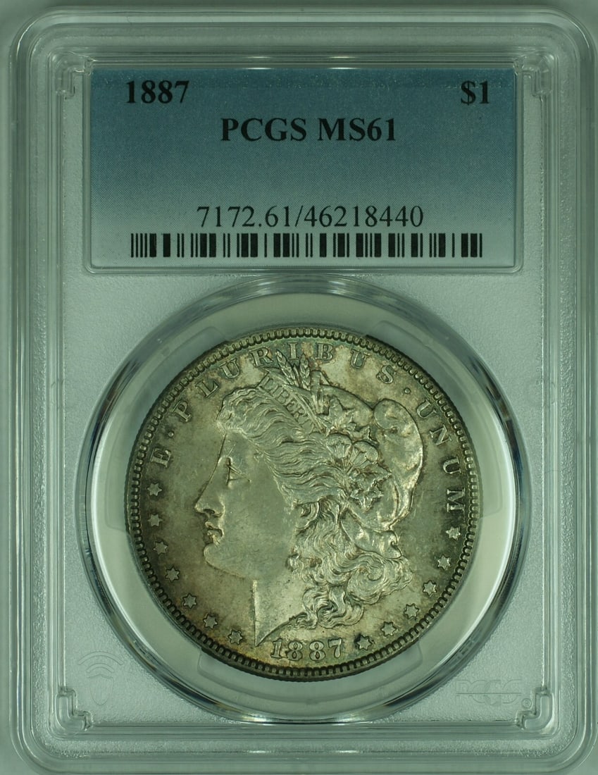 PCGS MS-61 1887 Morgan Dollar Uncirculated Silver Coin With Toning: PCGS MS-61 1887 Morgan Dollar Uncirculated Silver Coin With Toning This is an 1887 Morgan Silver Dollar graded MS-61 by PCGS, featuring attractive toning. The coin is uncirculated and was minted in Ph