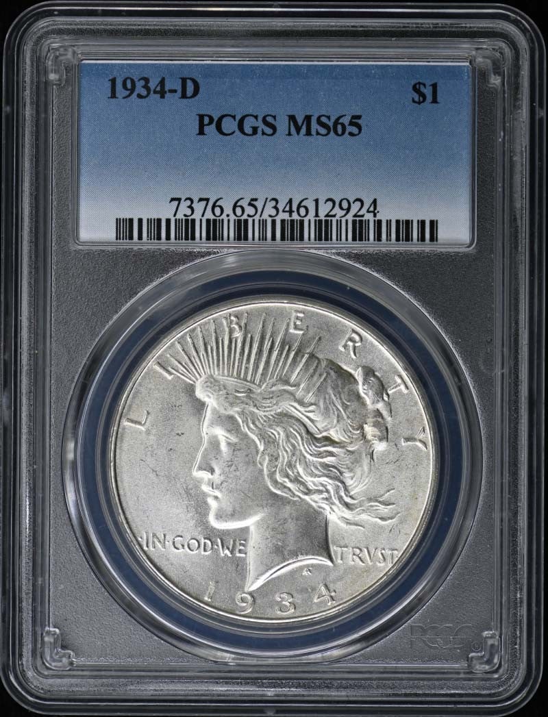 PCGS MS65 Peace Dollar 1934 Denver Mint Silver Coin: PCGS MS65 Peace Dollar 1934 Denver Mint Silver Coin This 1934-D Peace Dollar is graded MS65 by PCGS and remains in un-used condition. Struck at the Denver Mint, this United States silver dollar featur