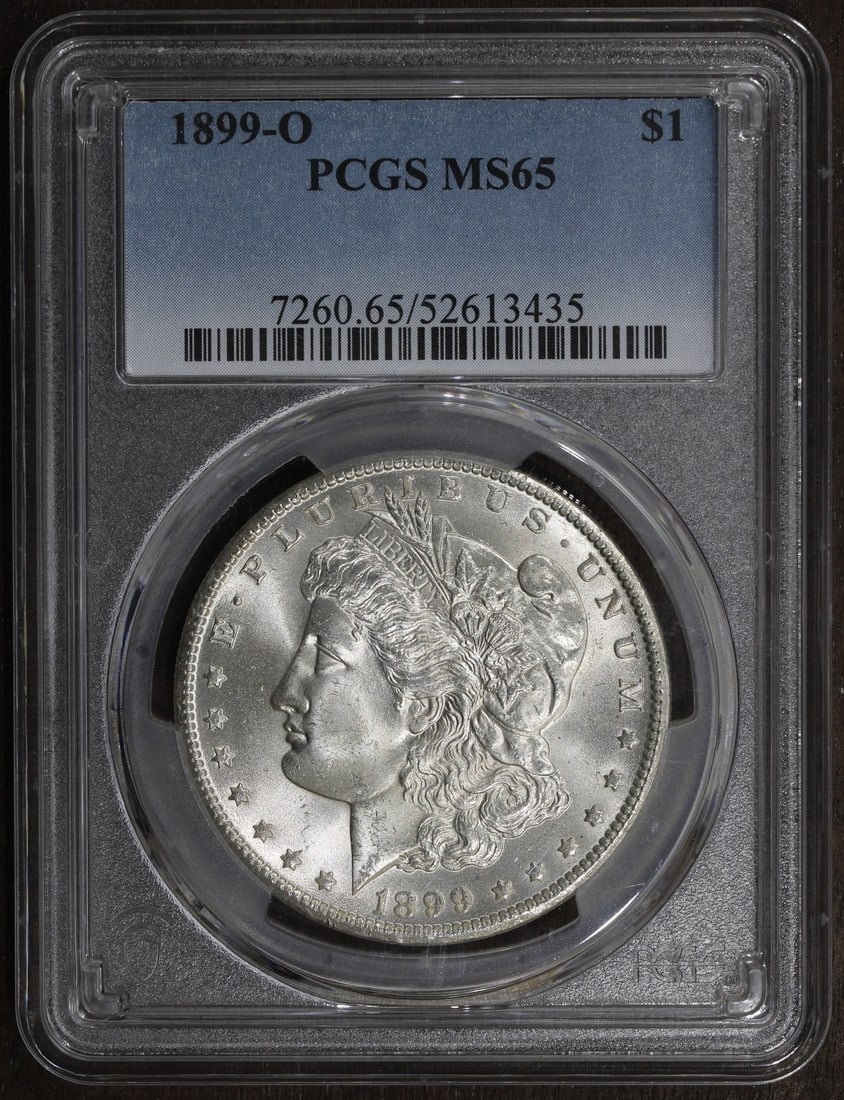 Morgan Dollar 1899 New Orleans MS65 Silver PCGS Certified Gem: Morgan Dollar 1899 New Orleans MS65 Silver PCGS Certified Gem This is a 1899-O Morgan Silver Dollar graded MS65 by PCGS. Struck at the New Orleans Mint, this uncirculated coin features a composition o