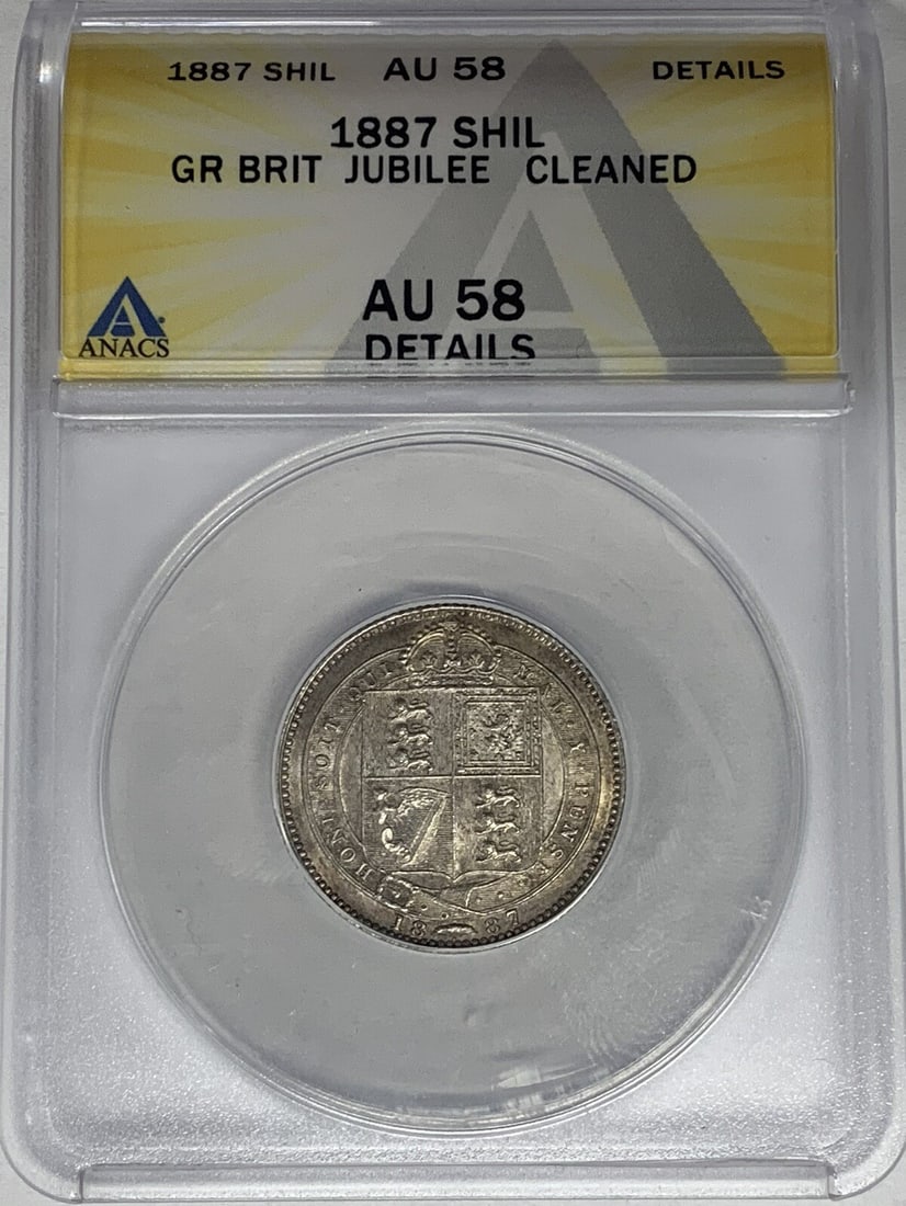 ANACS AU 58 1887 United Kingdom Shilling Cleaned: ANACS AU 58 1887 United Kingdom Shilling Cleaned This 1887 Great Britain shilling is certified by ANACS with a grade of AU 58 Details and has been noted as cleaned. It is a pre-owned coin from the Uni