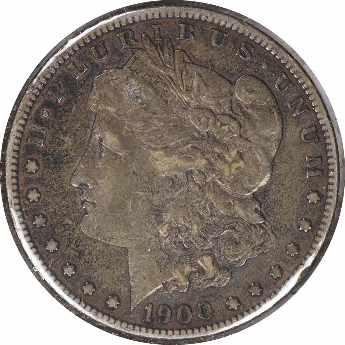 1900-O Morgan Silver Dollar VF Uncertified 90% Silver Coin: 1900-O Morgan Silver Dollar VF Uncertified 90% Silver Coin This 1900-O/CC Morgan Silver Dollar is a classic piece of American coinage, featuring the iconic design by George T. Morgan. This coin is in 