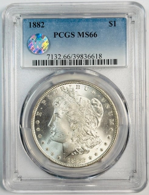 PCGS MS66 1882 Philadelphia Morgan Silver Dollar Uncirculated: PCGS MS66 1882 Philadelphia Morgan Silver Dollar Uncirculated This is an 1882 Morgan Silver Dollar from the Philadelphia Mint, certified by PCGS with a grade of MS 66. The coin is uncirculated and fea