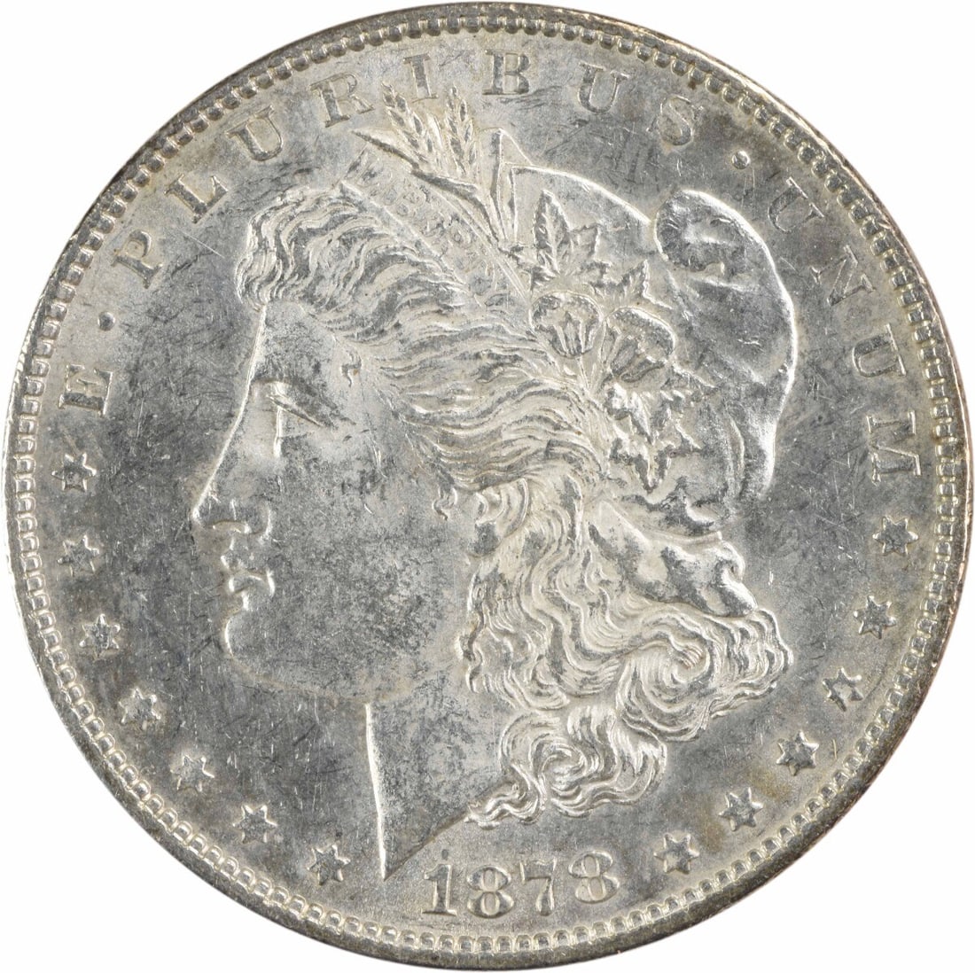 1878 Morgan Silver Dollar AU Uncertified 90% Silver Philadelphia Coin: 1878 Morgan Silver Dollar AU Uncertified 90% Silver Philadelphia Coin This 1878 Morgan Silver Dollar showcases the iconic design by George T. Morgan, featuring a beautiful depiction of Lady Liberty on