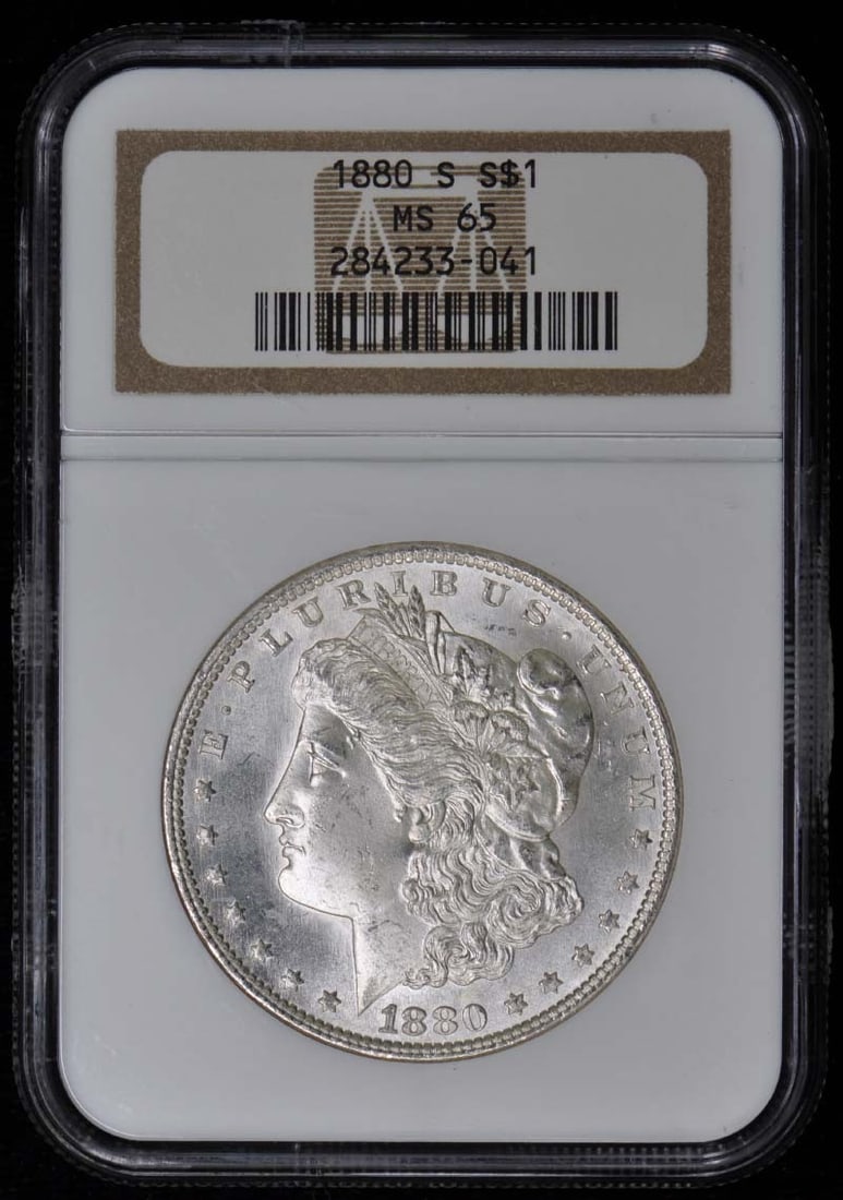 1880-S Morgan Dollar NGC MS65 Uncirculated San Francisco Coin: 1880-S Morgan Dollar NGC MS65 Uncirculated San Francisco Coin This 1880-S Morgan Dollar, graded MS65 by NGC, is an exceptional uncirculated coin from the San Francisco mint. It showcases the classic d