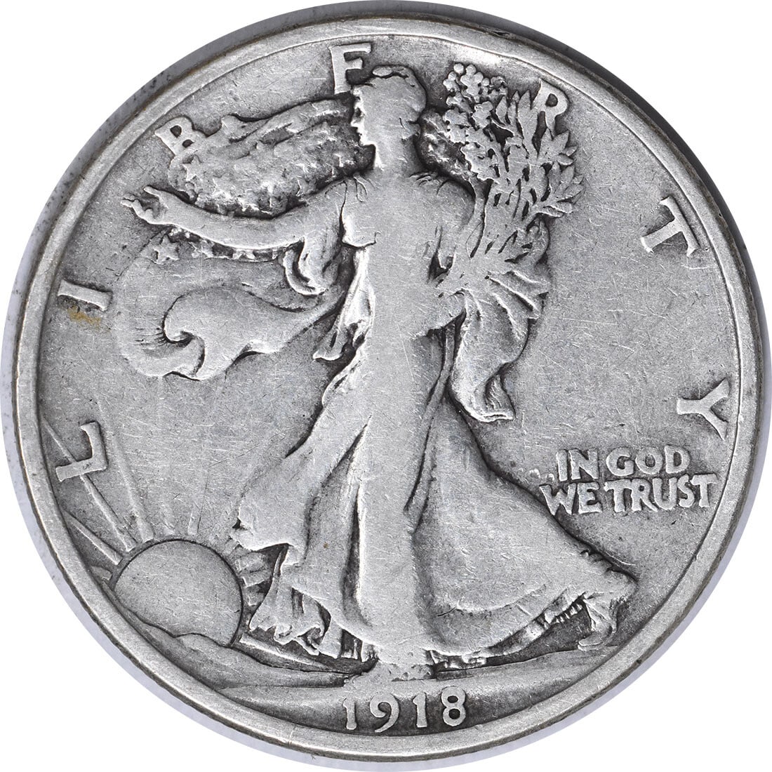 1918-D Walking Liberty Half Dollar 90% Silver by Weinman: 1918-D Walking Liberty Half Dollar 90% Silver by Weinman This 1918-D Walking Liberty Silver Half Dollar is a classic piece of American coinage. Featuring the renowned design by Adolph Alexander Weinma